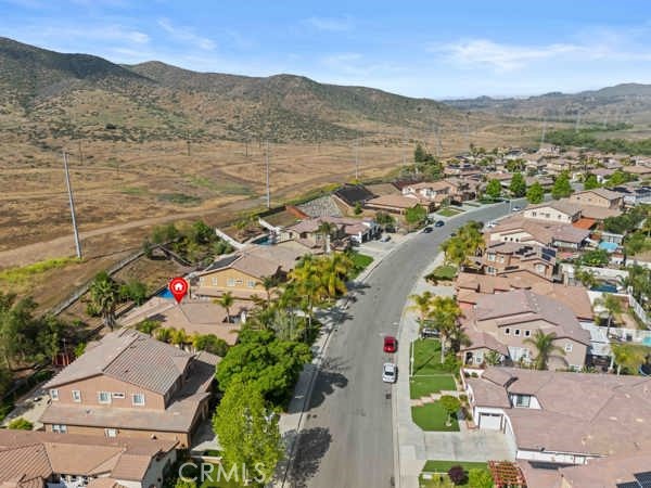 341 Caldera Street Perris, CA 92570 - Photo 14 of 53 an aerial view of lake and residential houses with outdoor space