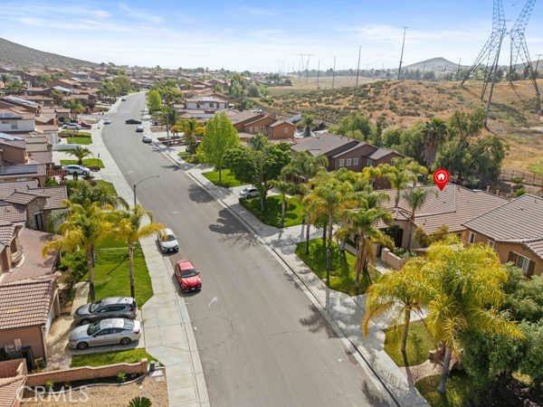 341 Caldera Street Perris, CA 92570 - Photo 15 of 53 an aerial view of residential houses with yard