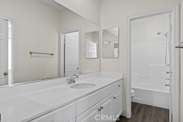 341 Caldera Street Perris, CA 92570 - Photo 28 of 53 a bathroom with a sink shower and a mirror
