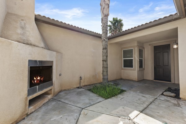 341 Caldera Street Perris, CA 92570 - Photo 4 of 53 a view of entryway with a yard
