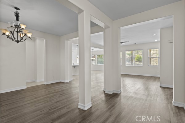 341 Caldera Street Perris, CA 92570 - Photo 44 of 53 wooden floor in an empty room with a window