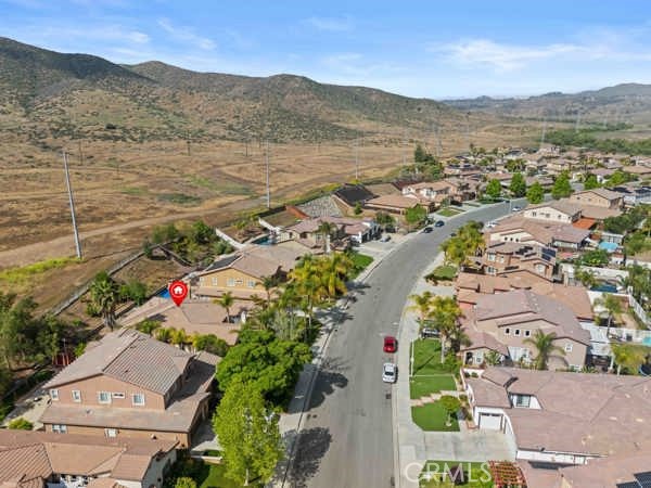 341 Caldera Street Perris, CA 92570 - Photo 8 of 53 an aerial view of lake and mountain view