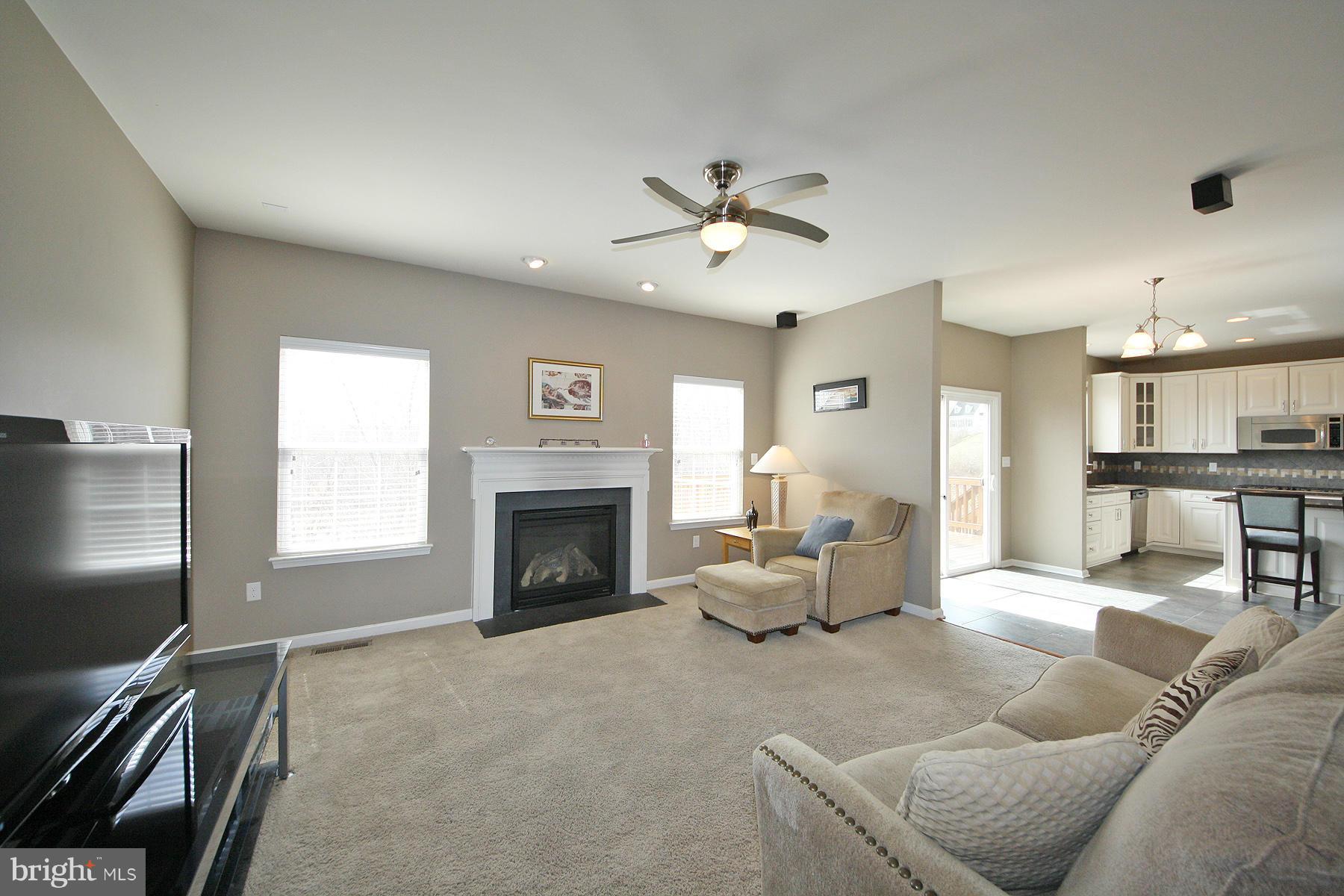 5946 Fairlee Road Elkridge, MD 21075 - Photo 13 of 29 Family Room with Ceiling Fan & Gas Fireplace