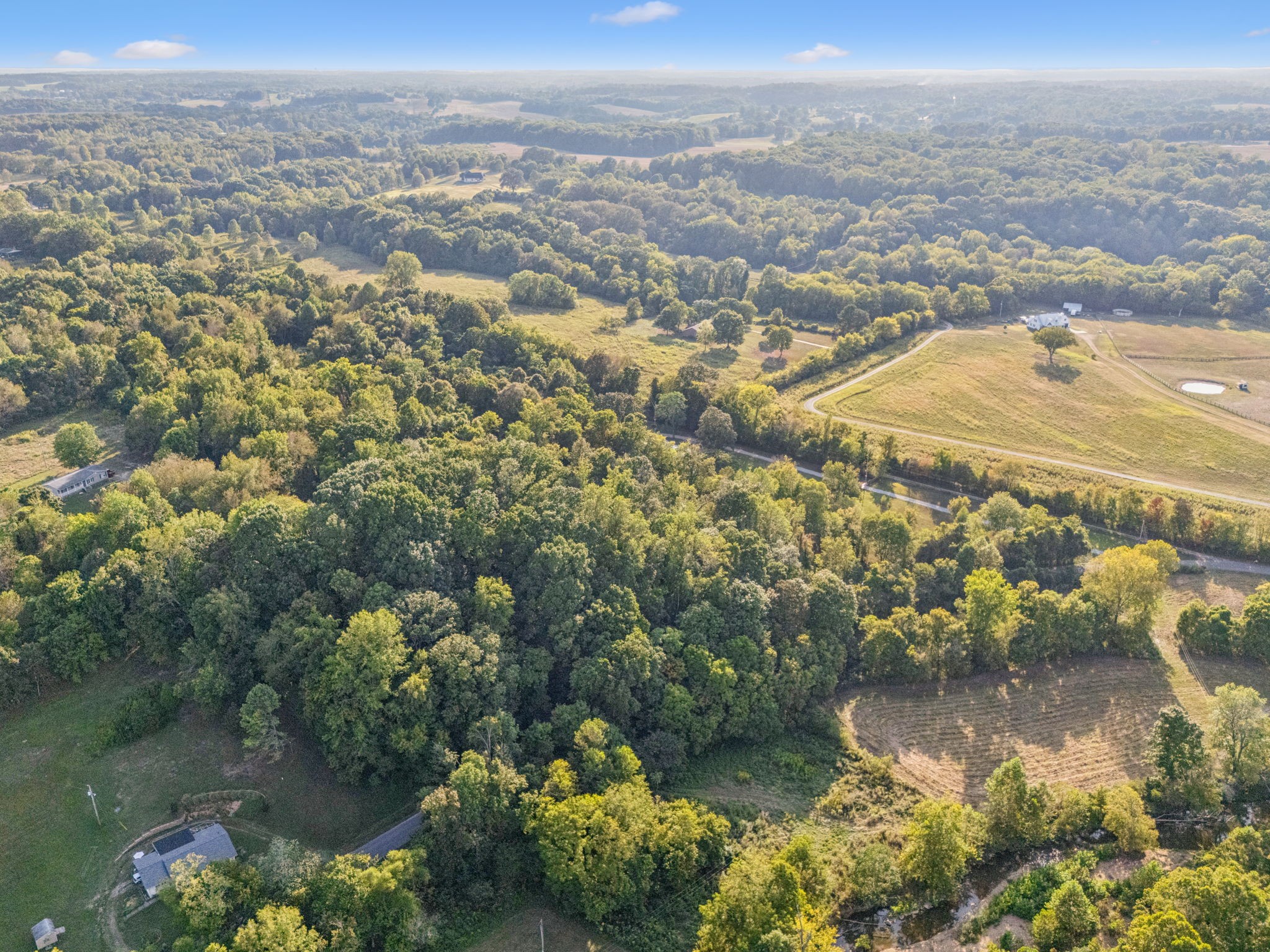 3294 Burr Road Springfield, TN 37172 - Photo 7 of 18 a view of a lake with mountains in the background