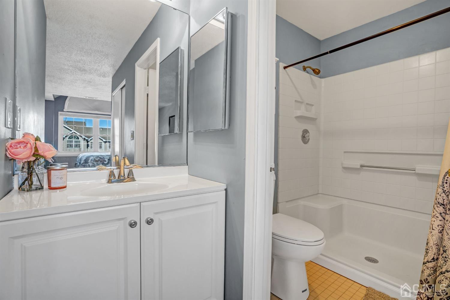 532 Edpas Road New Brunswick, NJ 08901 - Photo 21 of 29 a bathroom with a sink a toilet and shower