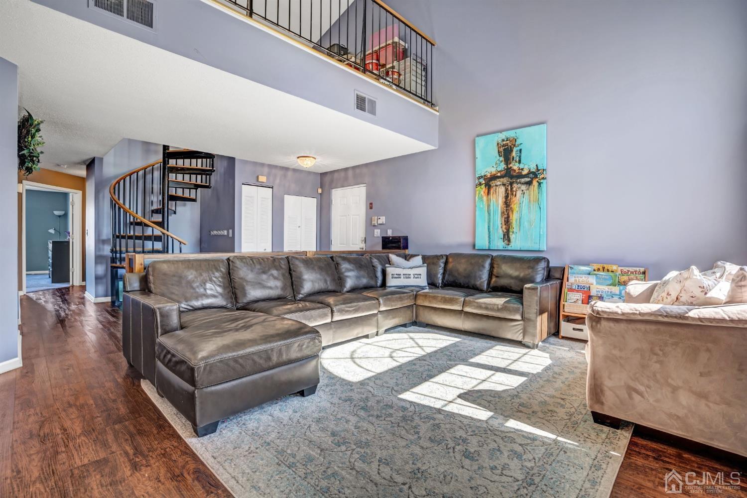 532 Edpas Road New Brunswick, NJ 08901 - Photo 7 of 29 a living room with furniture and painting on the wall
