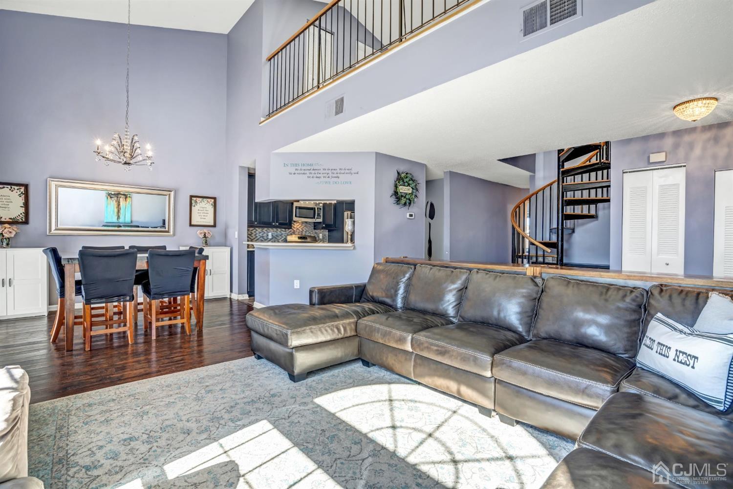 532 Edpas Road New Brunswick, NJ 08901 - Photo 8 of 29 a living room with furniture wooden floor and a view of kitchen