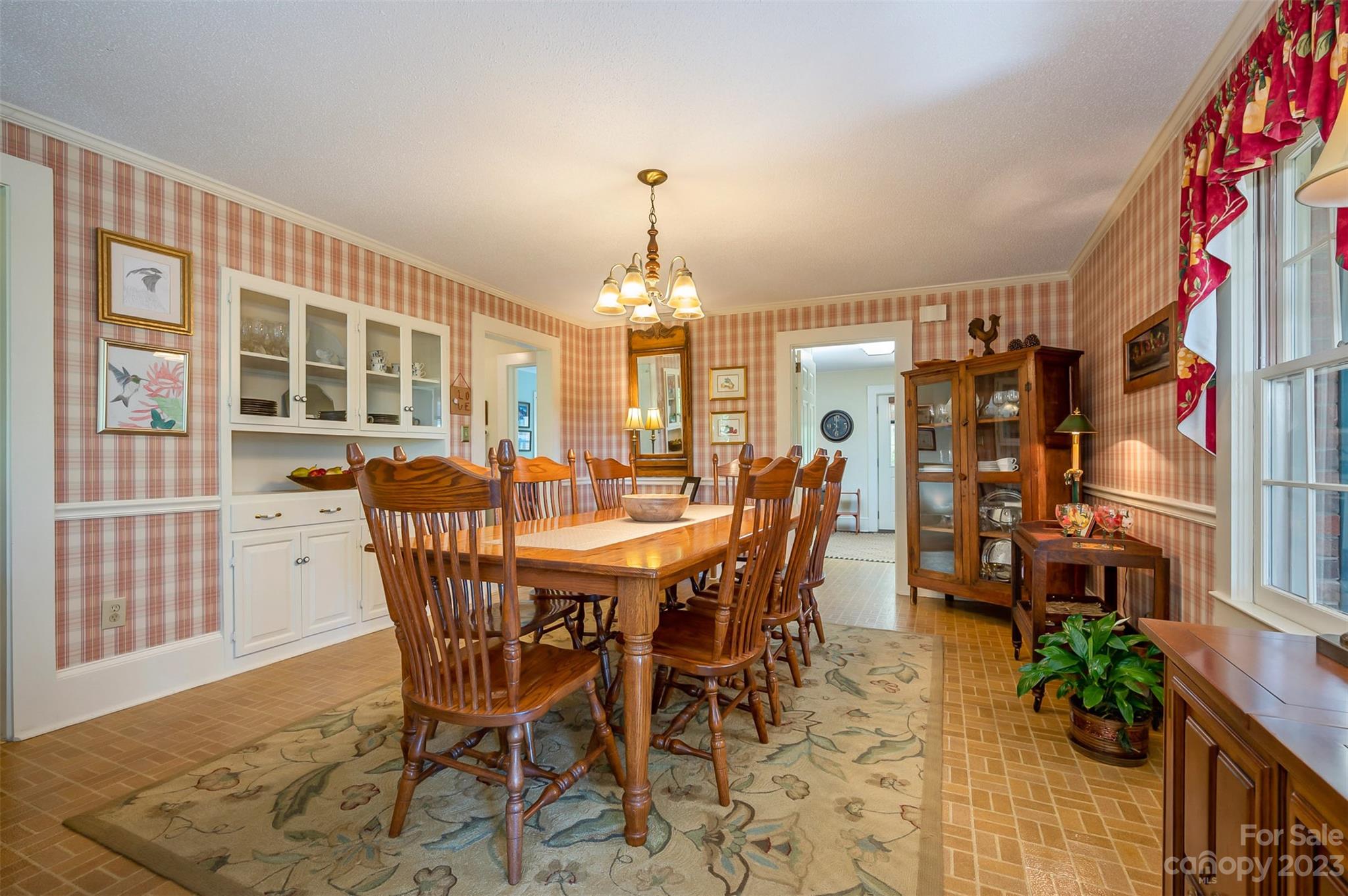 231 Old Gilbert Town Road Rutherfordton, NC 28139 - Photo 19 of 48 a view of a dining room with furniture and chandelier