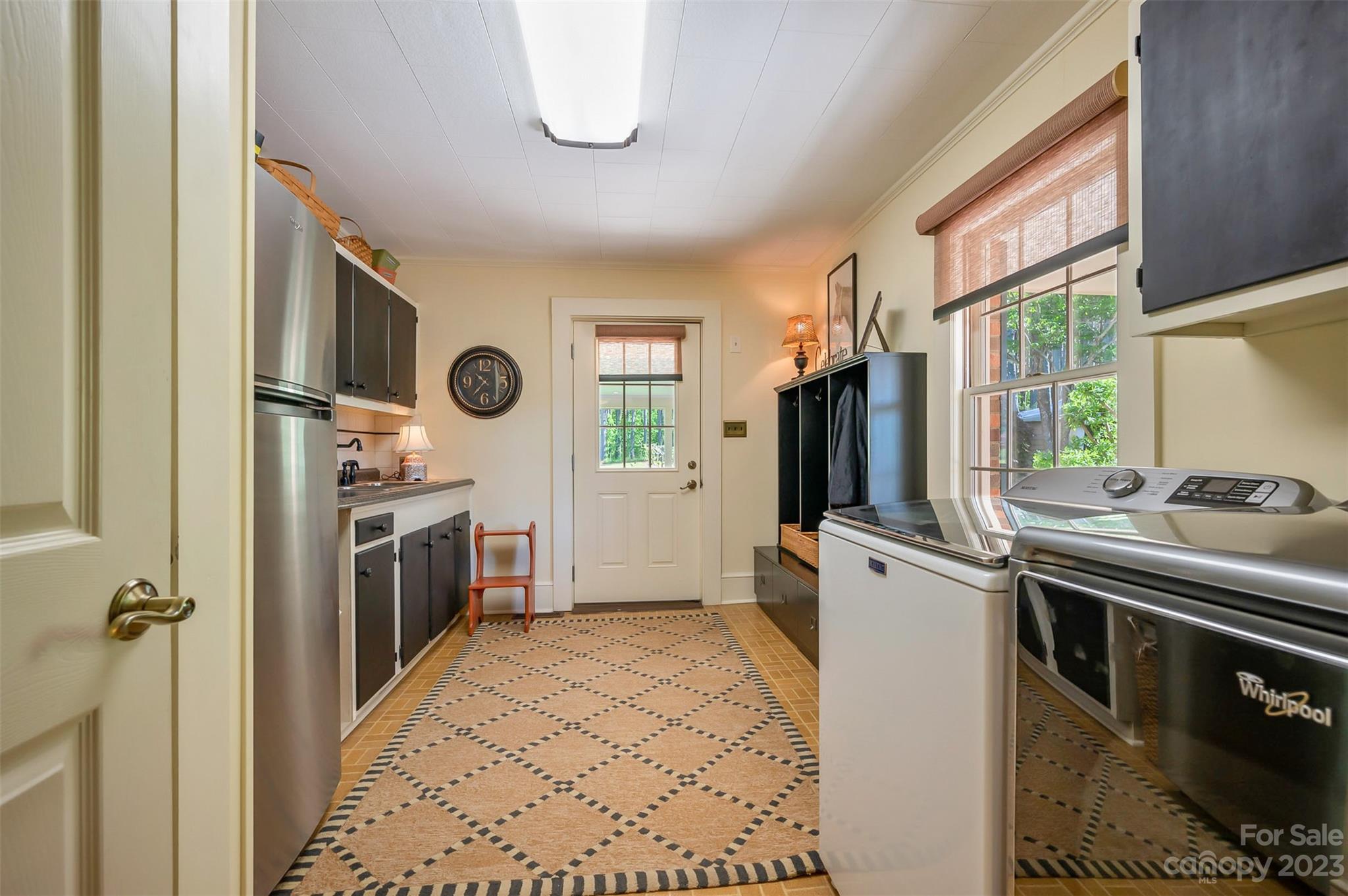231 Old Gilbert Town Road Rutherfordton, NC 28139 - Photo 20 of 48 a kitchen view with a stove a refrigerator and a sink
