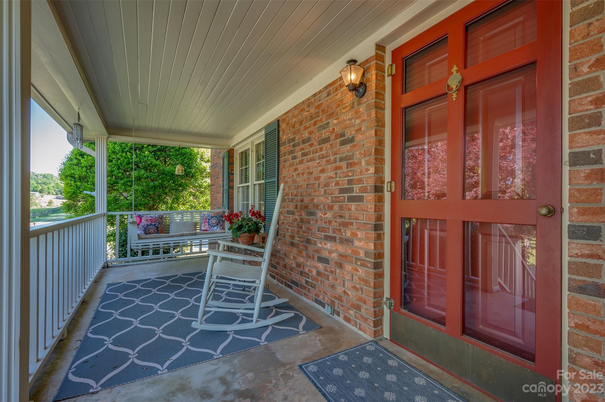 231 Old Gilbert Town Road Rutherfordton, NC 28139 - Photo 7 of 48 a view of a porch with chairs and wooden fence