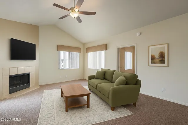 a kitchen with granite countertop a sink and a stove