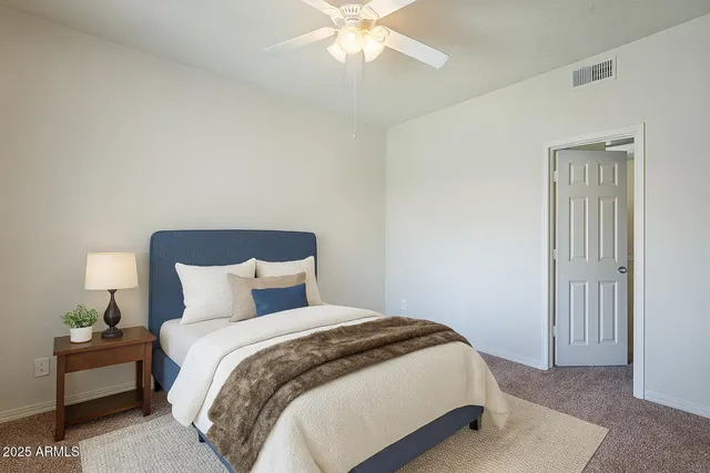 a room with window and cabinet