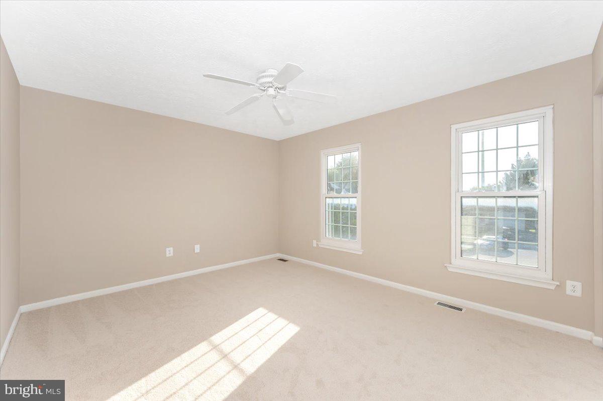 5004 Finch Court Frederick, MD 21703 - Photo 36 of 63 a view of an empty room with a window