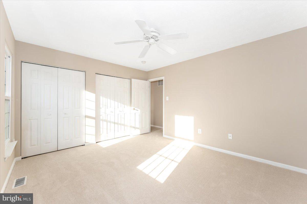 5004 Finch Court Frederick, MD 21703 - Photo 37 of 63 a view of an empty room with a window
