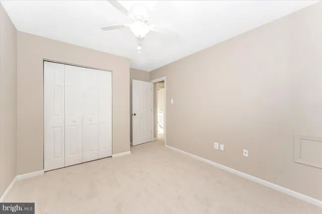 a view of a house with a yard balcony