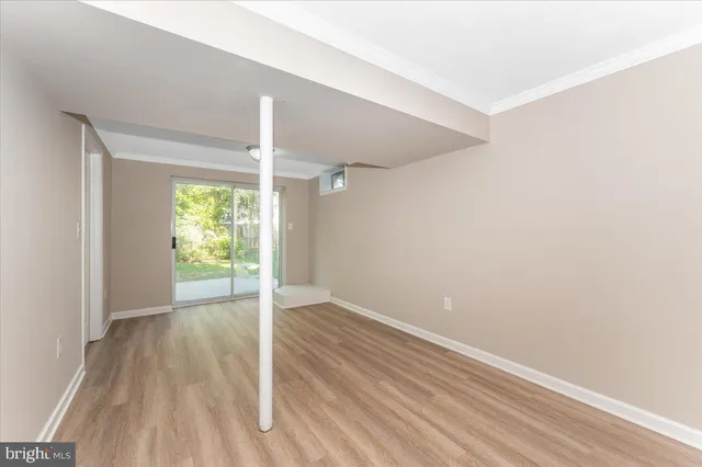 a view of a balcony with wooden floor
