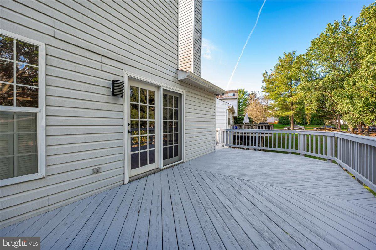 5004 Finch Court Frederick, MD 21703 - Photo 50 of 63 a view of a house with a deck