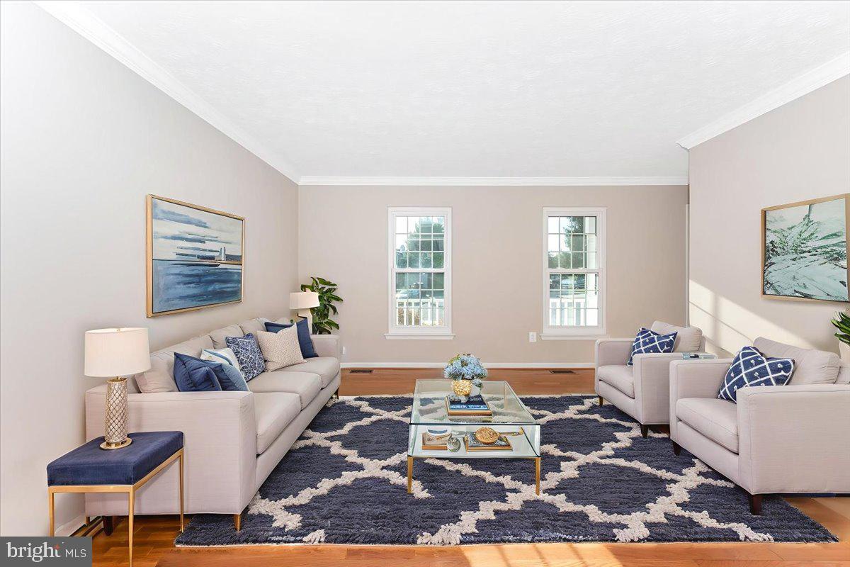 5004 Finch Court Frederick, MD 21703 - Photo 6 of 63 a living room with furniture rug and window