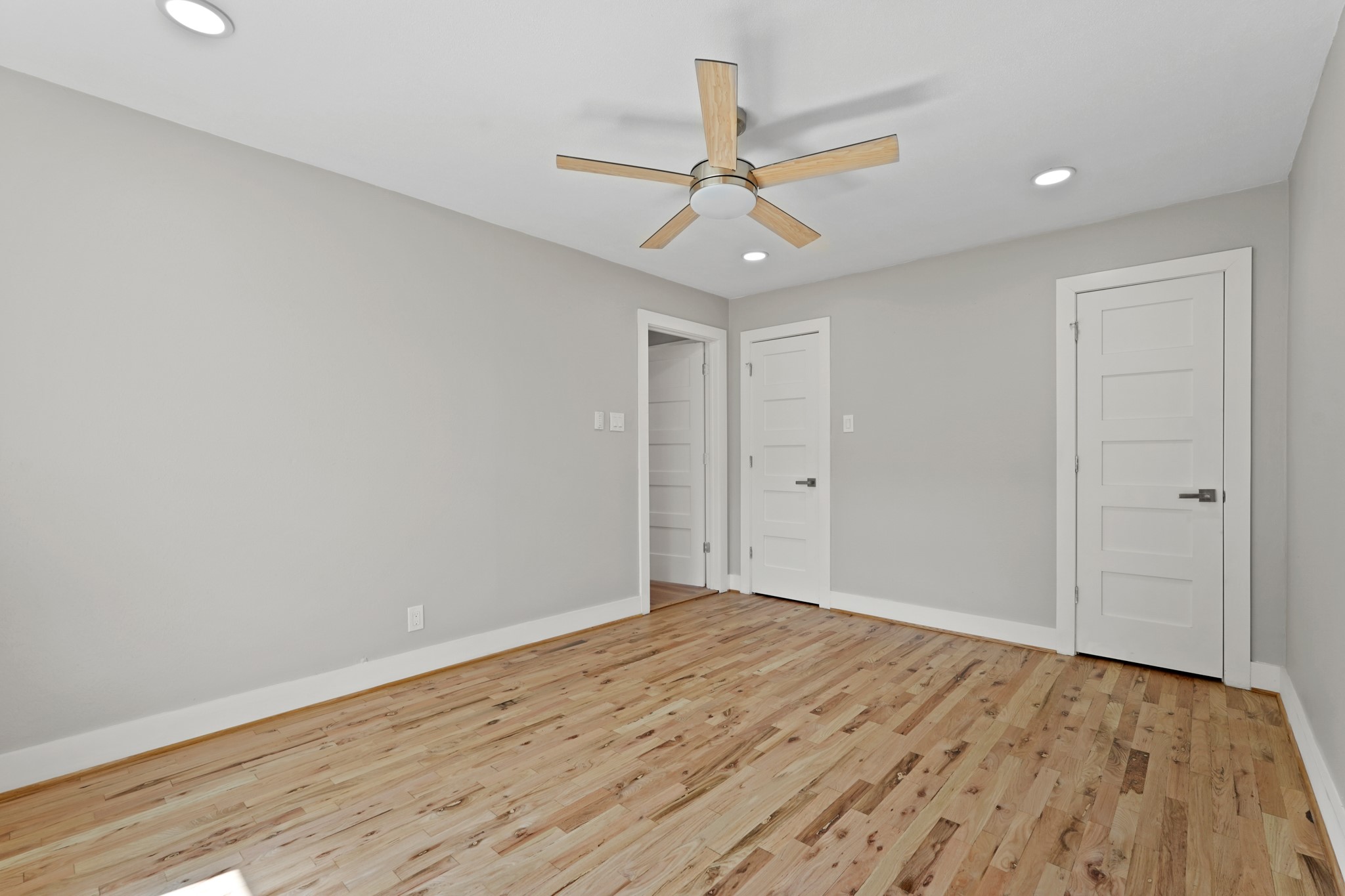 5451 Redstart Street Houston, TX 77096 - Photo 20 of 23 wooden floor in an empty room