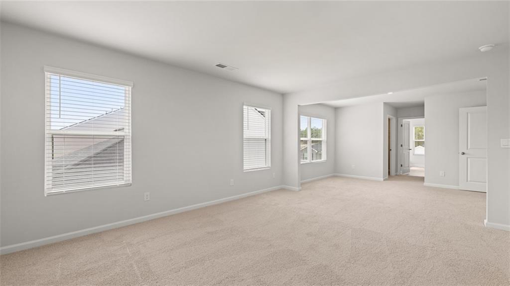 504 Bullock Pass Jefferson, GA 30549 - Photo 28 of 54 an empty room with windows