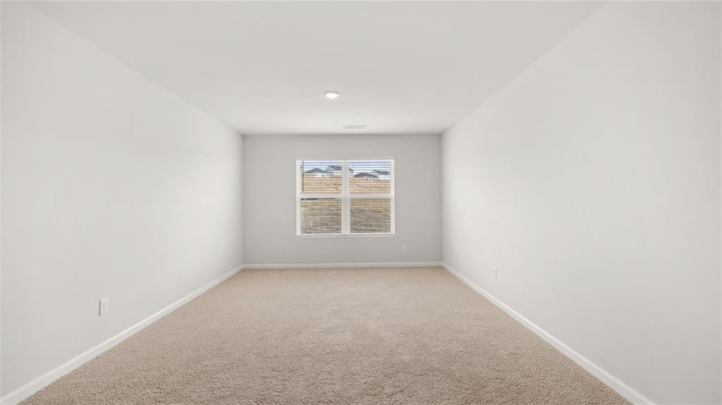 504 Bullock Pass Jefferson, GA 30549 - Photo 29 of 54 a view of an empty room with a window