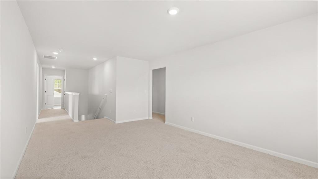 504 Bullock Pass Jefferson, GA 30549 - Photo 30 of 54 a view of a big room with a kitchen