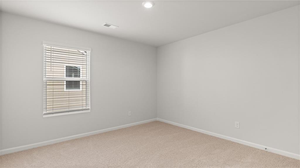 504 Bullock Pass Jefferson, GA 30549 - Photo 32 of 54 a view of an empty room with a window