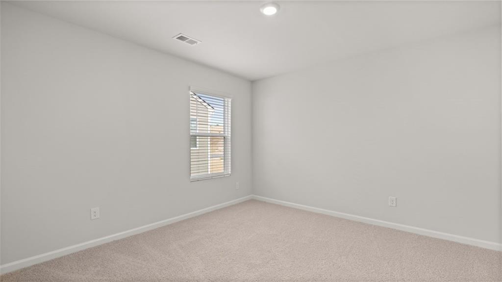 504 Bullock Pass Jefferson, GA 30549 - Photo 33 of 54 an empty room with a window