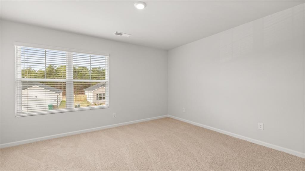 504 Bullock Pass Jefferson, GA 30549 - Photo 35 of 54 an empty room with a window