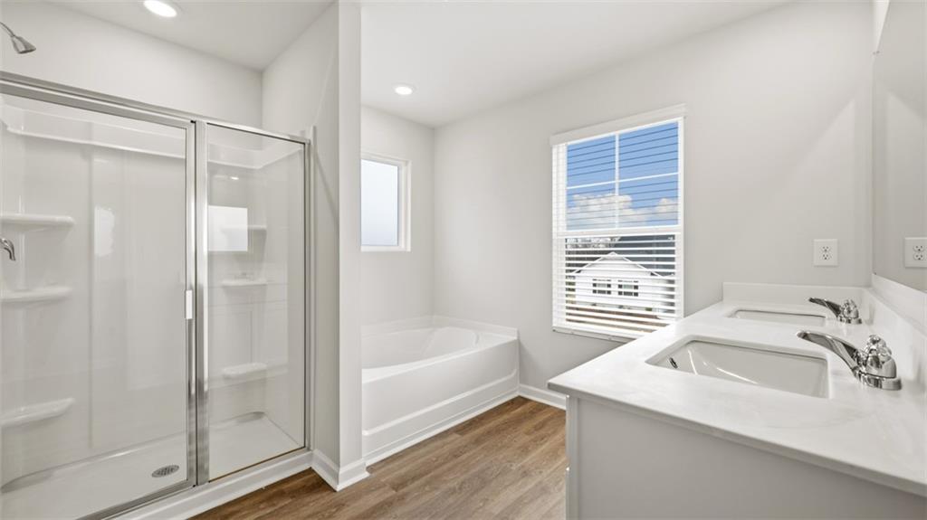 504 Bullock Pass Jefferson, GA 30549 - Photo 38 of 54 a bathroom with a tub sink and shower