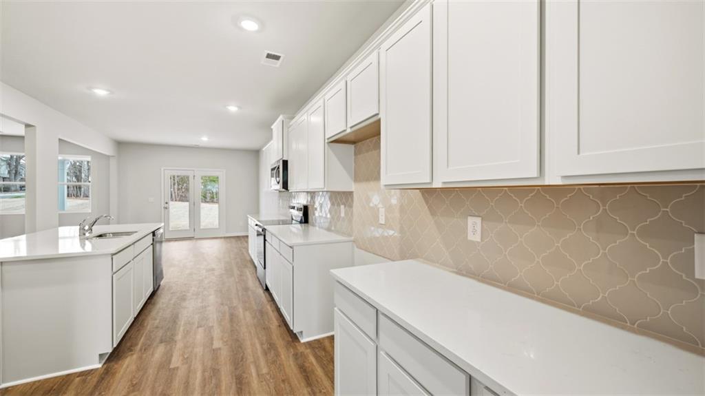 504 Bullock Pass Jefferson, GA 30549 - Photo 4 of 54 a view of a kitchen with electric appliances