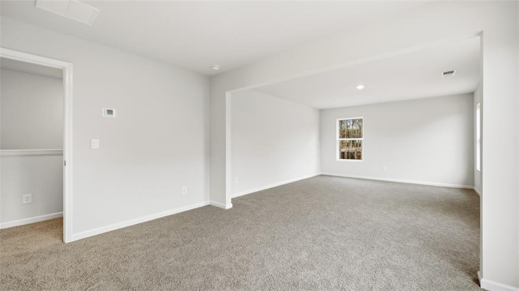 504 Bullock Pass Jefferson, GA 30549 - Photo 41 of 54 a view of an empty room with a window
