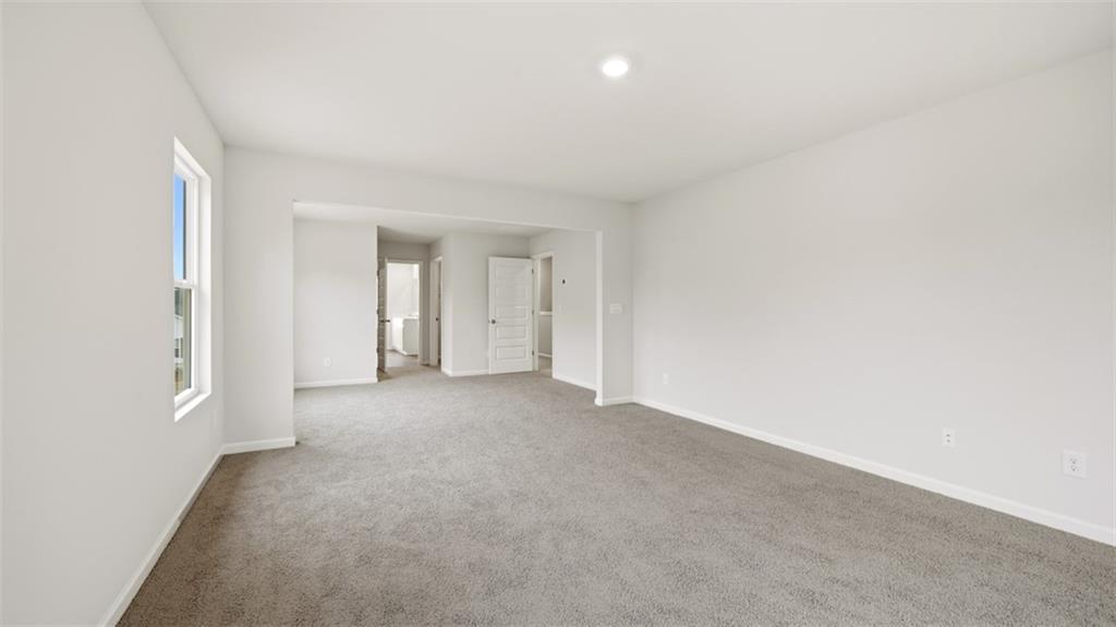 504 Bullock Pass Jefferson, GA 30549 - Photo 42 of 54 a view of a big room with closet and windows