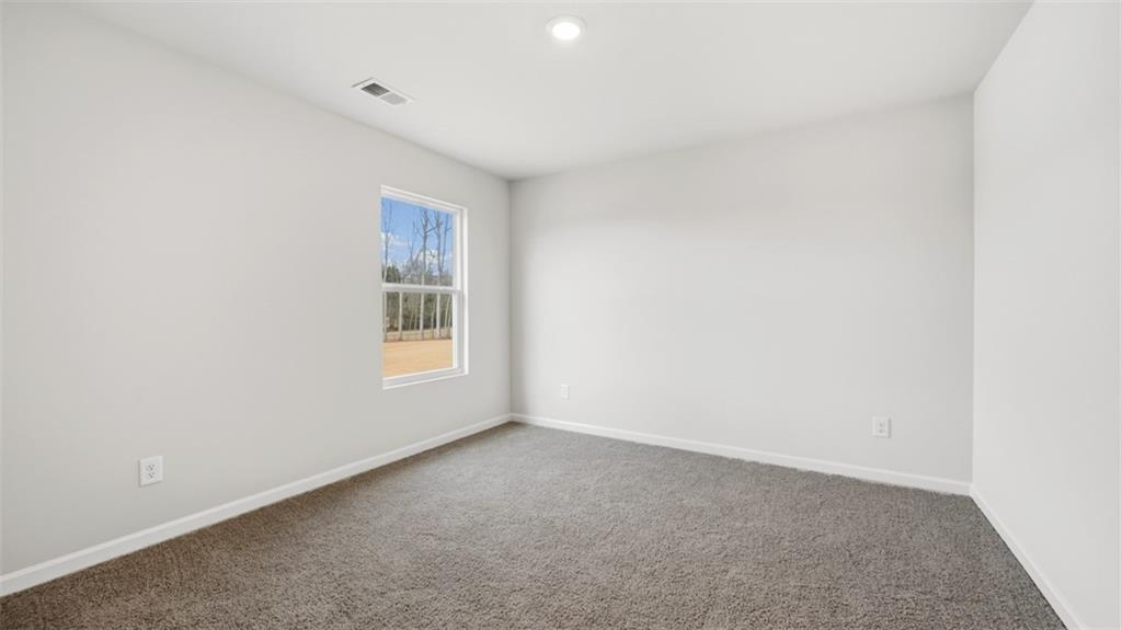 504 Bullock Pass Jefferson, GA 30549 - Photo 47 of 54 a view of an empty room with a window