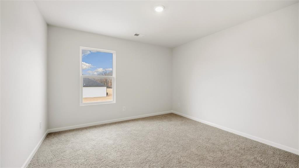 504 Bullock Pass Jefferson, GA 30549 - Photo 48 of 54 a view of an empty room with a window