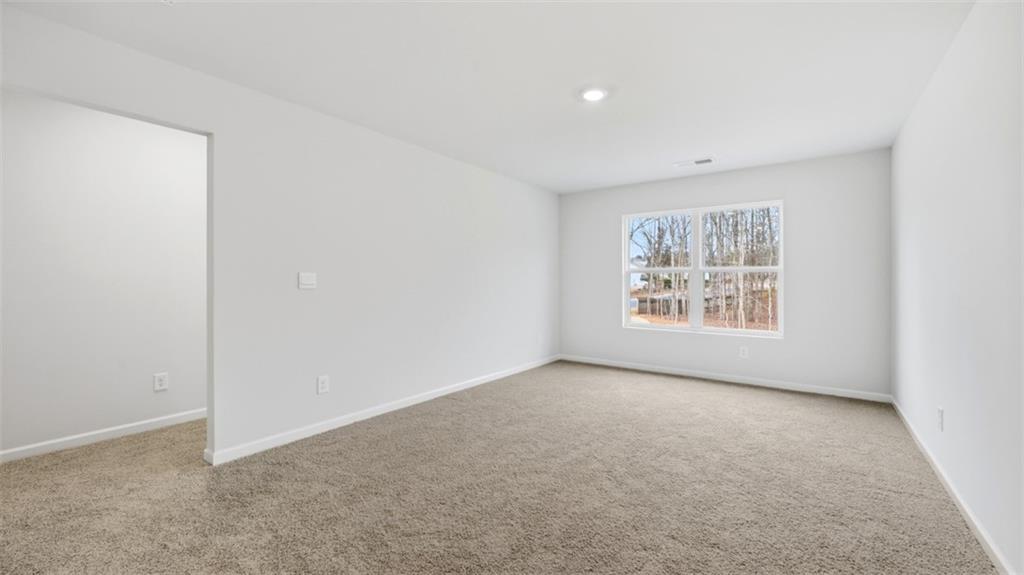 504 Bullock Pass Jefferson, GA 30549 - Photo 49 of 54 an empty room with windows