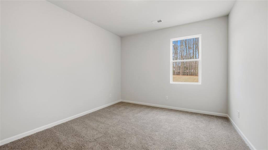 504 Bullock Pass Jefferson, GA 30549 - Photo 50 of 54 an empty room with a window