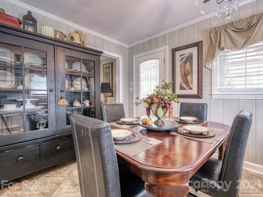 2823 Bettis Road Grover, NC 28073 - Photo 12 of 27 a dining room with furniture and window