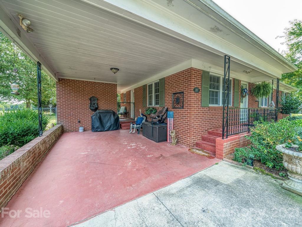 2823 Bettis Road Grover, NC 28073 - Photo 22 of 27 a front view of a house with garden