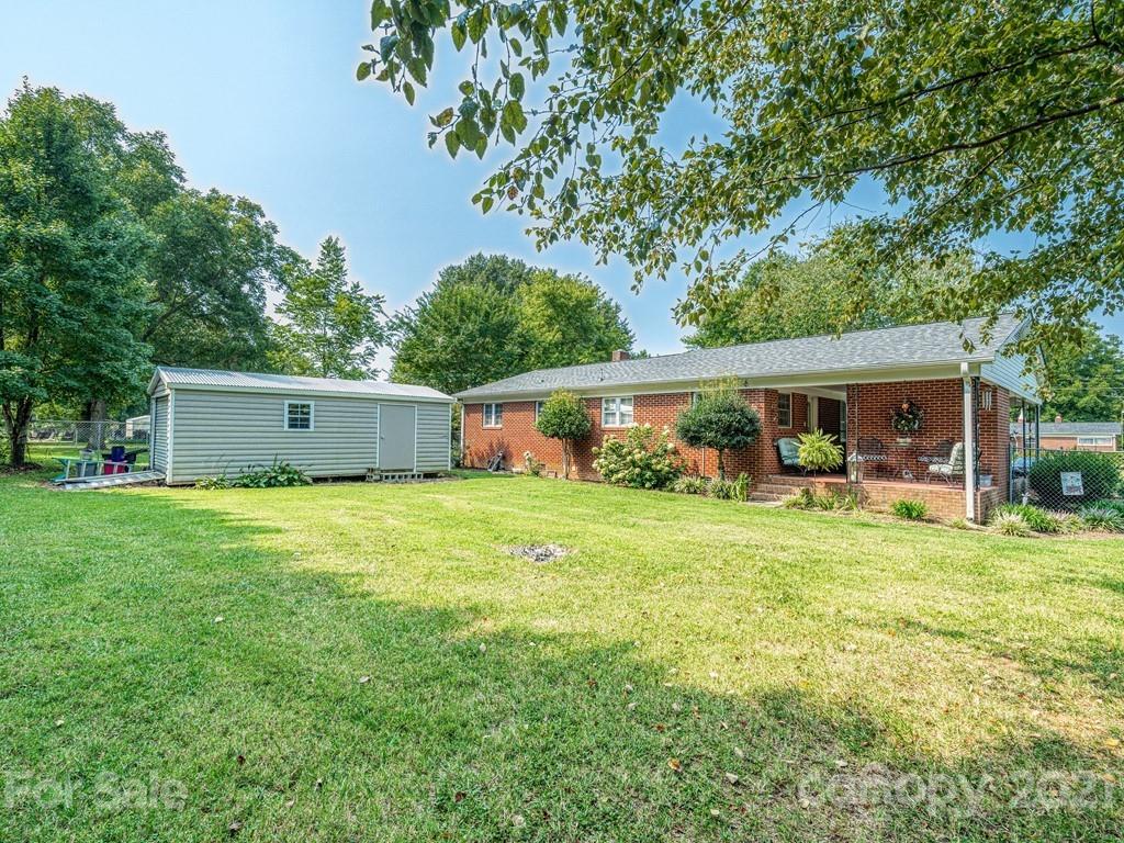 2823 Bettis Road Grover, NC 28073 - Photo 25 of 27 a front view of house with a garden and porch