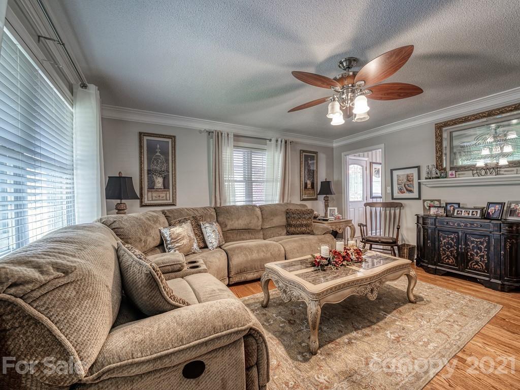 2823 Bettis Road Grover, NC 28073 - Photo 4 of 27 a living room with furniture and a fireplace