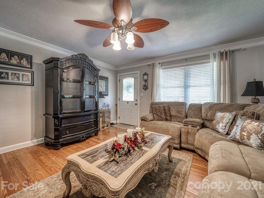 2823 Bettis Road Grover, NC 28073 - Photo 5 of 27 a living room with furniture and wooden floor
