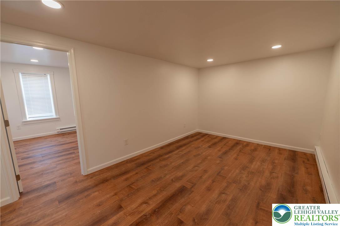 1261 State Street, Unit C Mertztown, PA 19539 - Photo 2 of 13 a view of empty room with wooden floor