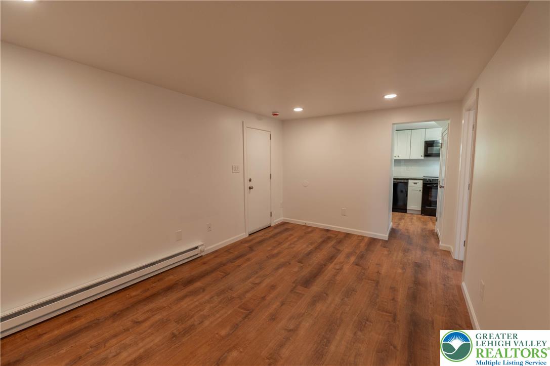 1261 State Street, Unit C Mertztown, PA 19539 - Photo 3 of 13 a view of empty room with wooden floor