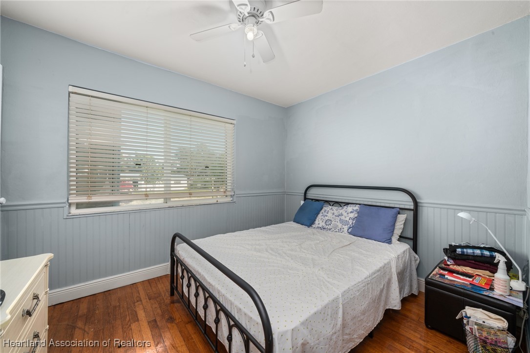 1612 Hitakee Avenue Sebring, FL 33870 - Photo 20 of 32 a bedroom with a bed and a window