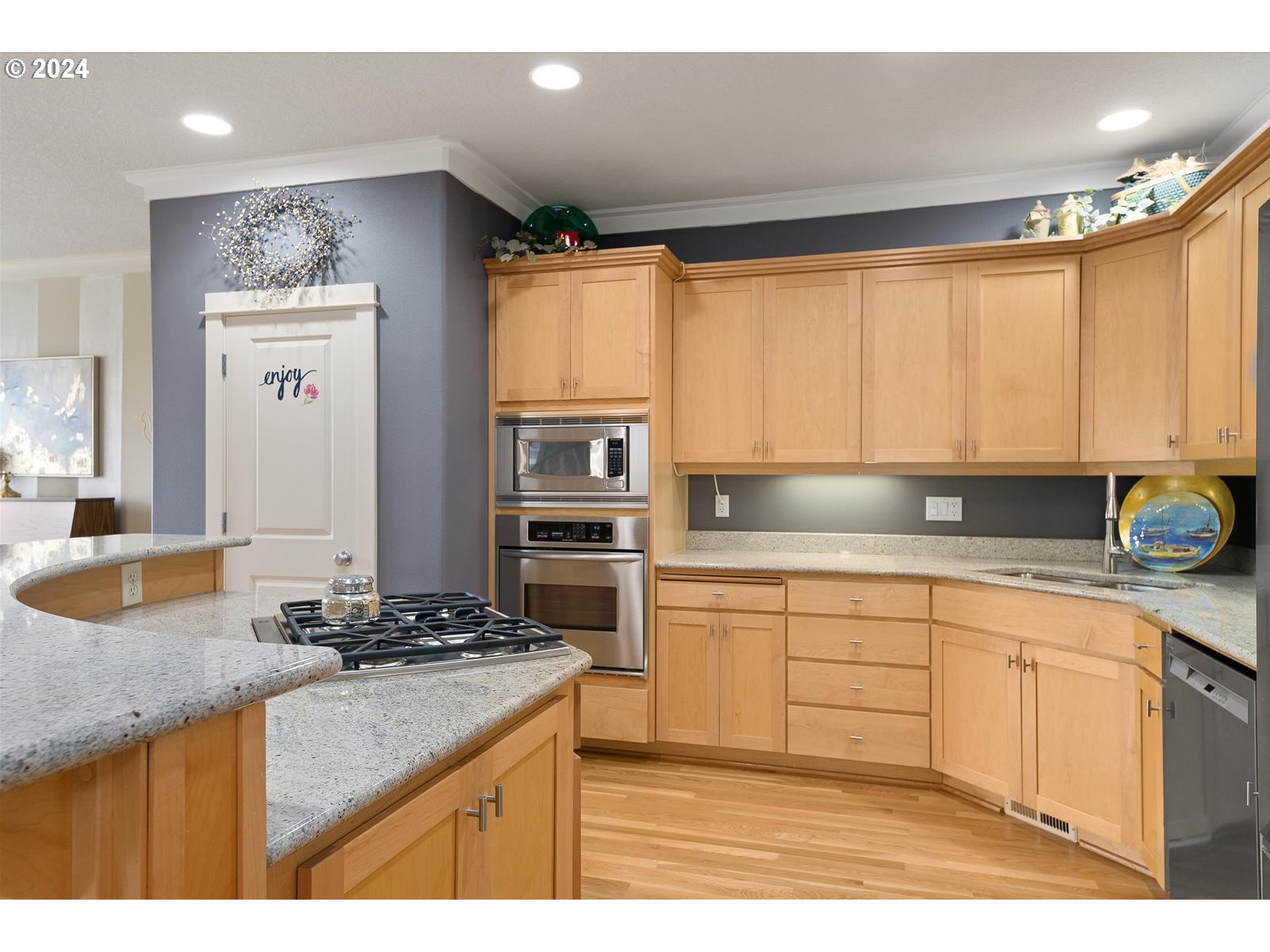 2224 Lucerne Place West Linn, OR 97068 - Photo 12 of 26 a kitchen with stainless steel appliances granite countertop a sink stove and cabinets