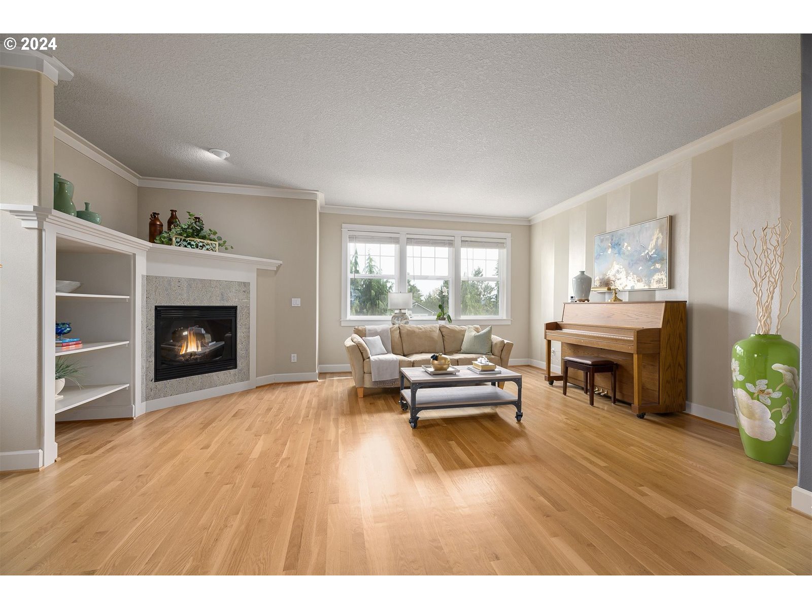 2224 Lucerne Place West Linn, OR 97068 - Photo 14 of 26 a living room with furniture and a fireplace