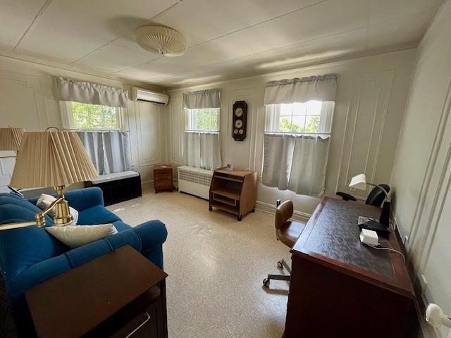 3201 Fillmore Avenue Brooklyn, NY 11234 - Photo 11 of 16 a living room with furniture and a window