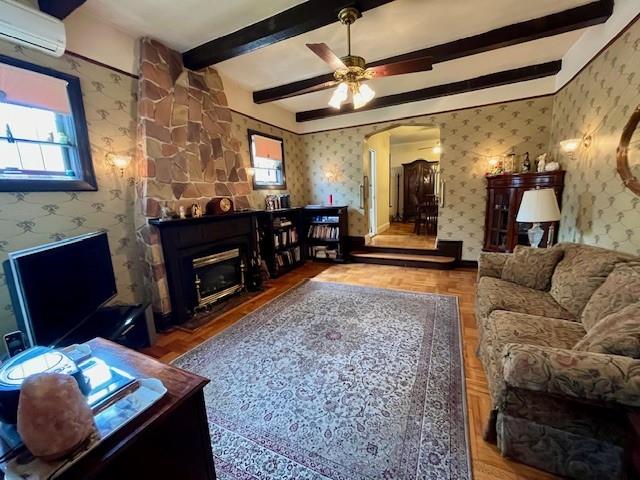 3201 Fillmore Avenue Brooklyn, NY 11234 - Photo 4 of 16 a living room with furniture and a fireplace