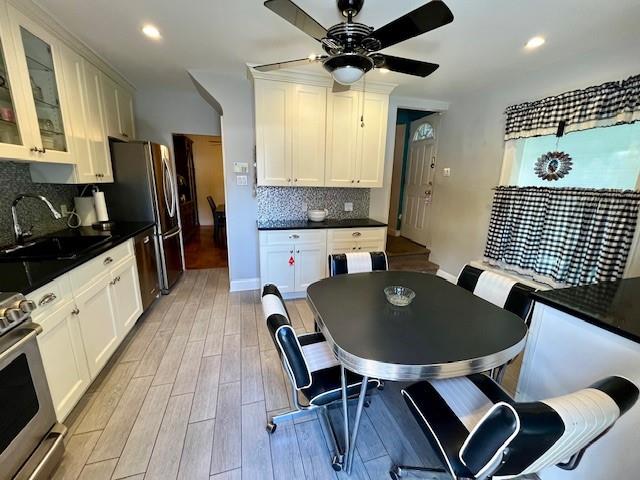 3201 Fillmore Avenue Brooklyn, NY 11234 - Photo 10 of 16 a kitchen with a dining table chairs and refrigerator